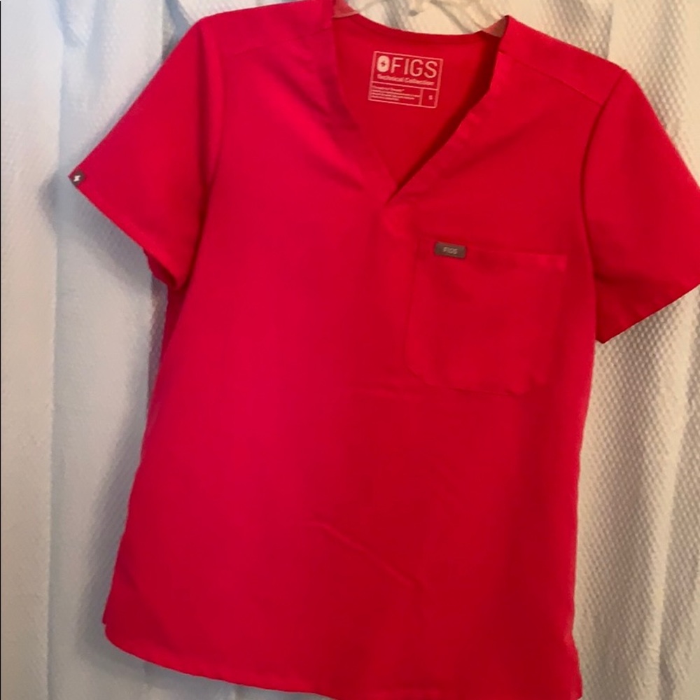 Fish hot pink scrub top, no pants.